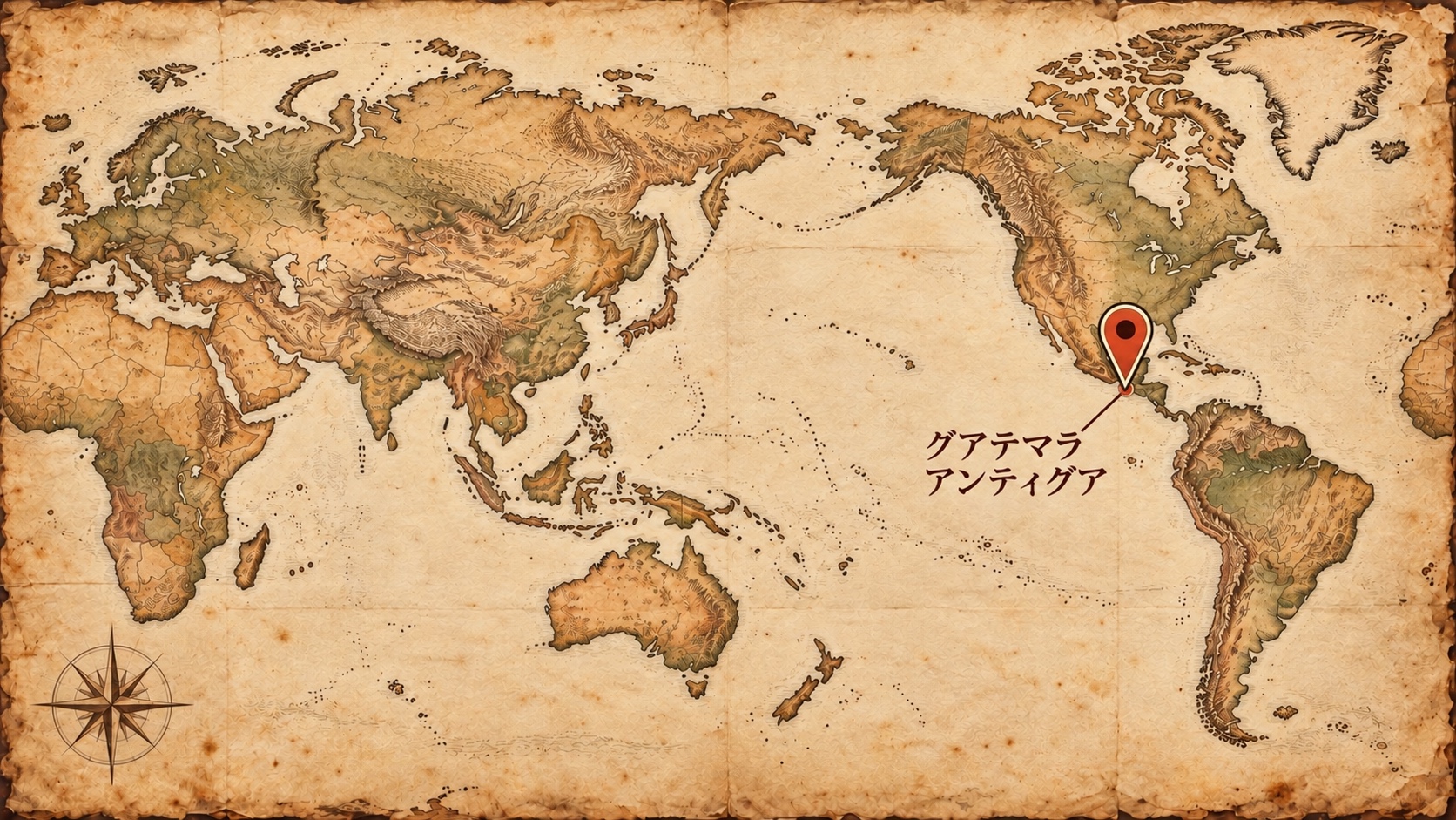 古い紙を模した日本中心の世界地図に、グアテマラのアンティグア周辺の位置を示した図